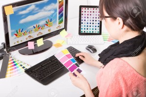 27356838-Graphic-designer-at-work-Color-swatch-samples--Stock-Photo-design